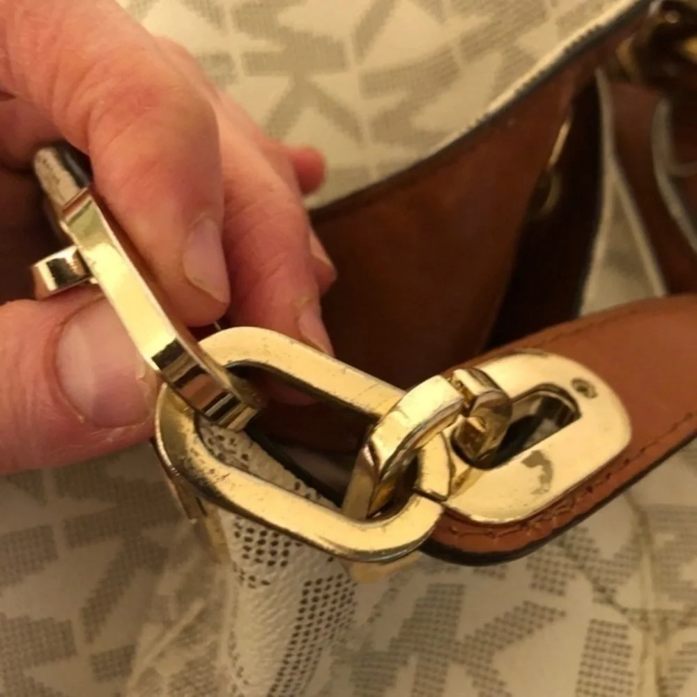 Michael kors white monogram triple compartment bag